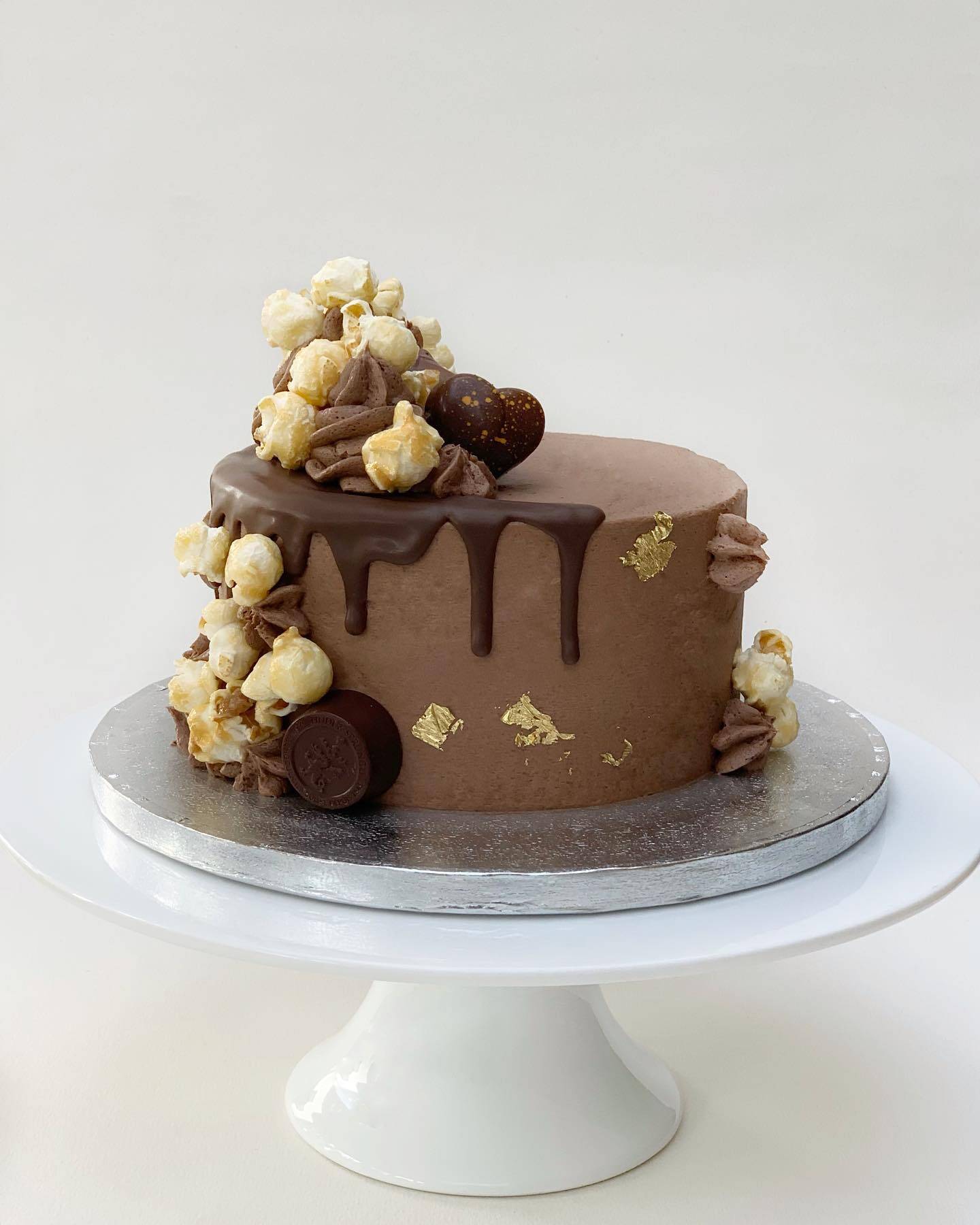 Decadent Triple chocolate cake with a touch of Caramel Popcorn