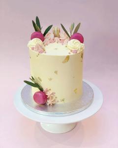 Pink macarons and gold leaf cake